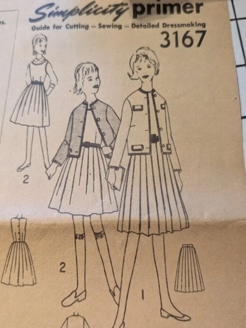 simplicity 7487 sewing pattern girls skirt, jacket, jumper